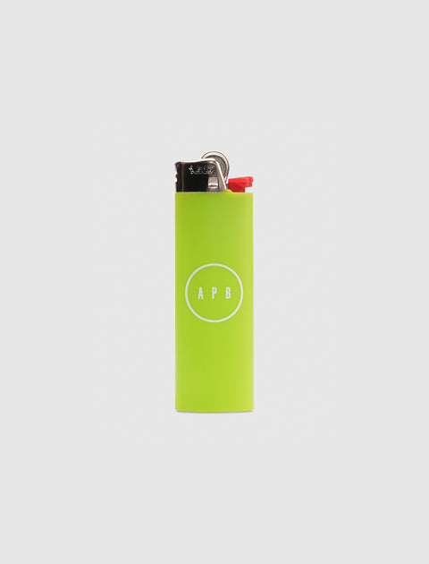 Green lighter with APB logo, minimalist design on white background