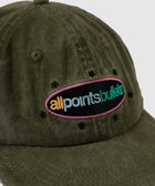 Olive green corduroy baseball cap with colorful embroidered all points bulletin logo and black stars