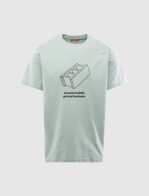 Light blue men's streetwear t-shirt with cinder block graphic and text on front