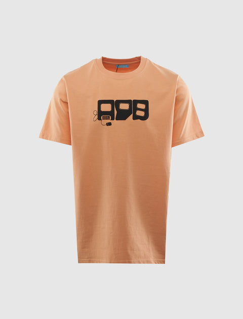 Peach short sleeve streetwear t-shirt with bold black graphic print on chest, front view