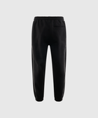 Black men's streetwear jogger pants with white side piping and elastic cuffs, rear view