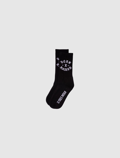 Black crew socks with white gothic text, men's streetwear accessory on neutral background