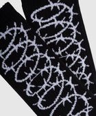 Black ribbed socks with white barbed wire graphic streetwear design