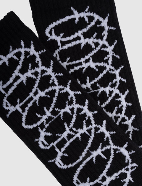 Black ribbed socks with white barbed wire graphic streetwear design