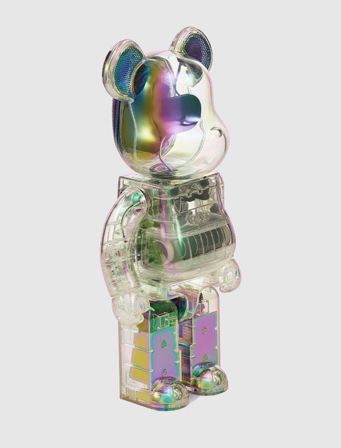 Clear iridescent bear-shaped collectible toy on white background
