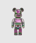Iridescent bear-shaped collectible art toy with metallic green and purple finish on white background