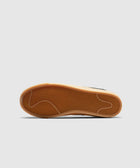 Gum sole sneaker with herringbone tread pattern, streetwear footwear on white background