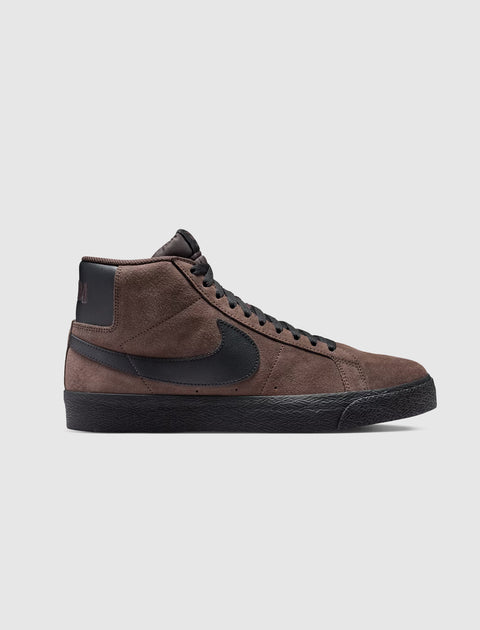 Brown and black suede high-top sneaker with black laces and textured black sole
