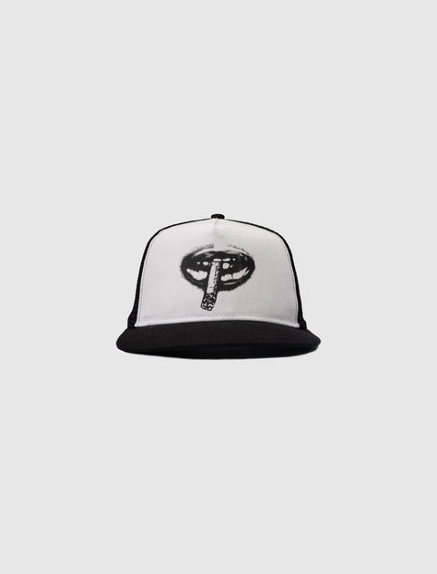 Indigo trucker hat with black mesh and graphic of lips with a smoking cigar on the front panel