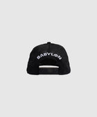 Back of black mesh trucker hat with white BABYLON embroidery and adjustable snapback