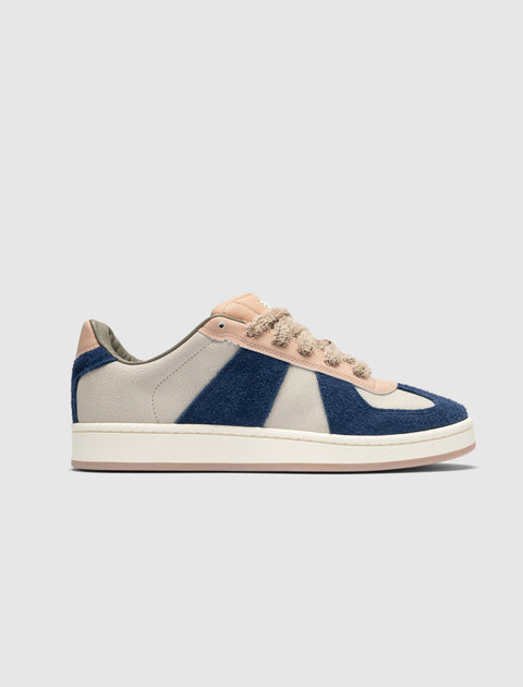 Men's low-top sneaker with blue suede and beige leather panels, beige laces, white sole