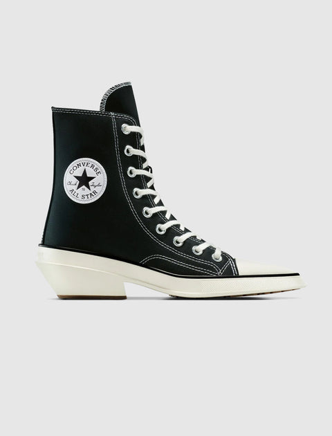 Black high-top sneaker with white laces, round logo patch, and unique block heel design.