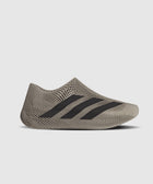 Beige mesh slip-on sneaker with black stripes and sculpted futuristic design side view