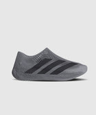 Grey mesh slip-on sneaker with black stripes, minimalist streetwear shoe design