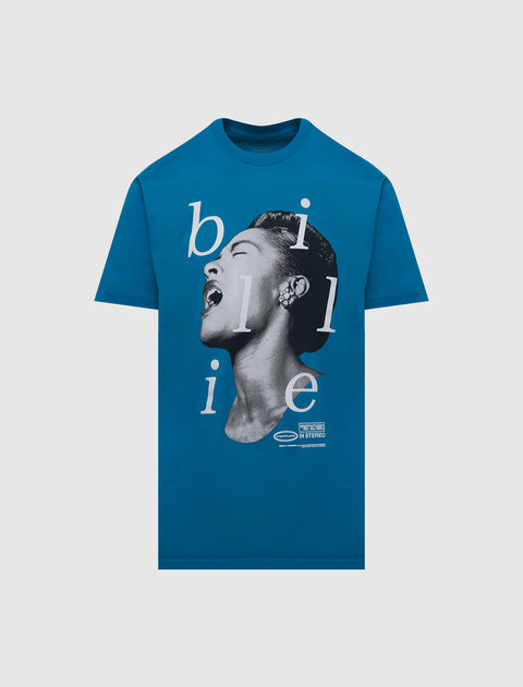 Blue graphic streetwear t-shirt featuring a large portrait and stylized text on the front