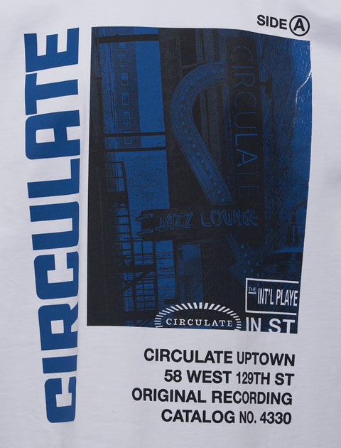 White streetwear t-shirt with blue graphic print, jazz lounge and bold 'CIRCULATE' text