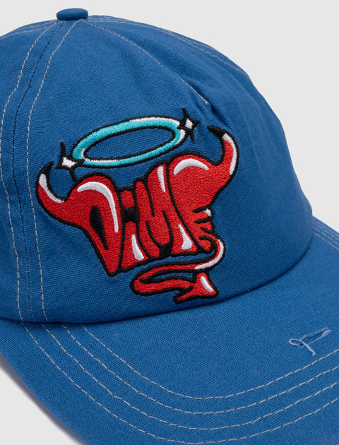 Blue streetwear cap with red devil horns and blue halo embroidered graphic on front