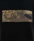 Black streetwear t-shirt with car skid mark graphic in parking lot forming Dime logo