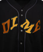 Black men's streetwear button-up jersey with yellow embroidered DIME logo on chest