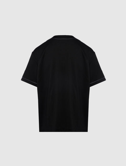 Back view of plain black short sleeve men's streetwear shirt on white background