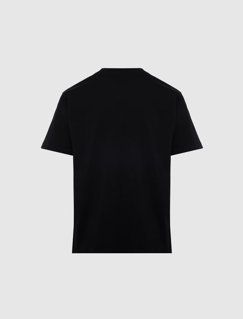 Back view of plain black men's short sleeve streetwear t-shirt on light background