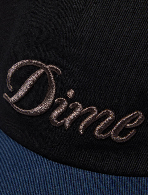 Black and navy baseball cap with Dime logo embroidered in brown on the front panel