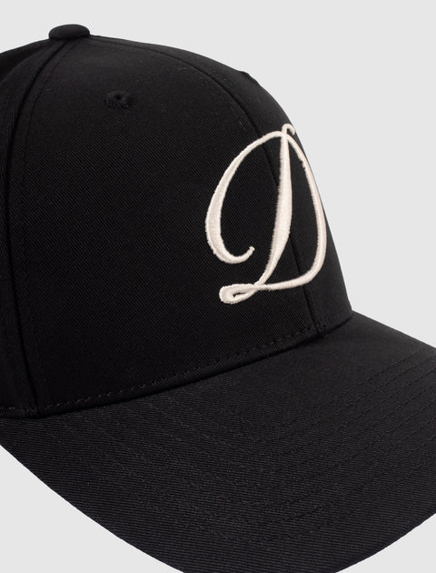 Black streetwear baseball hat with large white embroidered D logo on front