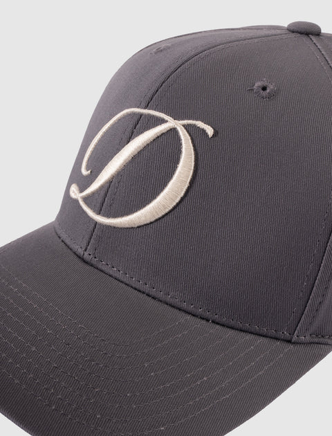 Grey baseball cap with large embroidered cream letter D on the front panel