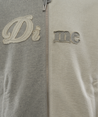 Two-tone zip-up hoodie with textured 'Dime' logo embroidery on chest, streetwear style