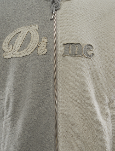 Two-tone zip-up hoodie with textured 'Dime' logo embroidery on chest, streetwear style
