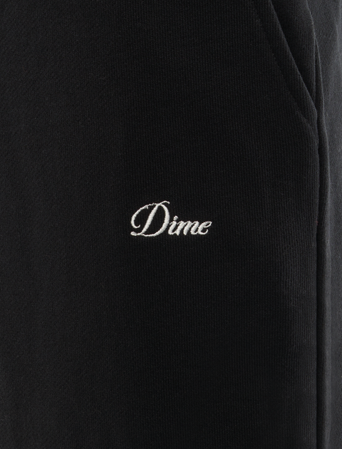 Black streetwear joggers with white Dime logo embroidery near pocket