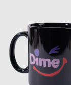 Black ceramic mug with Dime logo and colorful winking smiley face graphic