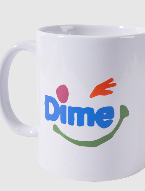 White ceramic mug with colorful smiley face and 'Dime' graphic on front