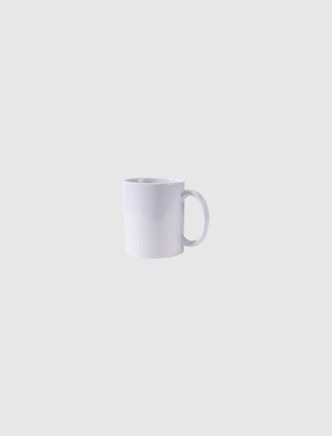 plain white ceramic mug on light gray background, minimal drinkware product photo