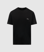 Black short sleeve men's streetwear t-shirt with small white chest logo on plain background