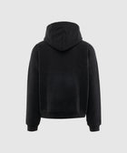 Back view of a plain black hooded streetwear sweatshirt on light background