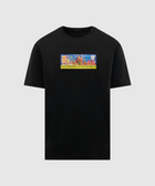 Black short-sleeve streetwear t-shirt with colorful graphic patch on chest, text reads $DIMESTORES.