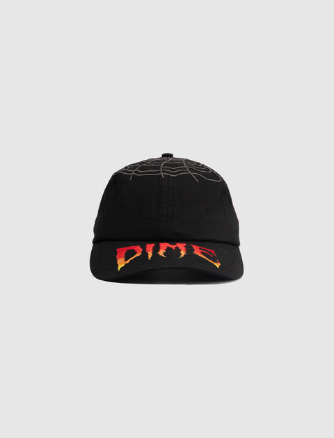 Black streetwear cap with red and yellow DIME logo and spiderweb embroidery on top
