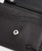 Closeup of a black leather wallet with embossed Dime logo and metal snap closure.
