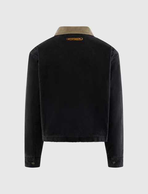 Back view of a black men's streetwear jacket with a contrasting tan collar and yellow text detail