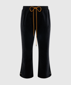 Men's black cropped streetwear pants with yellow drawstring and wide leg silhouette
