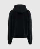 Back view of plain black men's streetwear hoodie on a light background