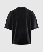 Back view of a plain black oversized men's streetwear t-shirt on a light background