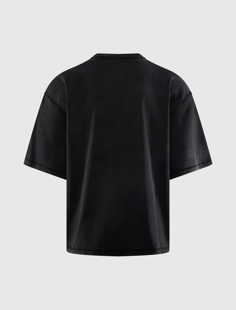 Back view of a plain black oversized men's streetwear t-shirt on a light background