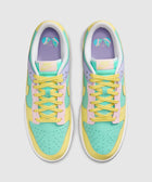 Colorful pastel low-top sneakers with mint green, yellow, pink, and lavender panels, viewed from above.