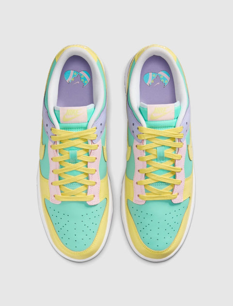 Colorful pastel low-top sneakers with mint green, yellow, pink, and lavender panels, viewed from above.