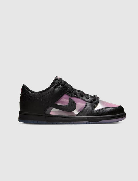 Black and pink low-top sneaker with translucent panels on a light gray background