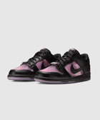 Pink and black low-top sneakers with translucent panels and black laces on a white background.