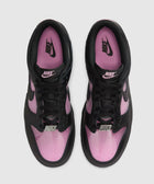 Top view of black and pink low-top Nike sneakers with perforated toe box
