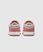 Back view of pink and white Nike Dunk Low sneakers on a white background